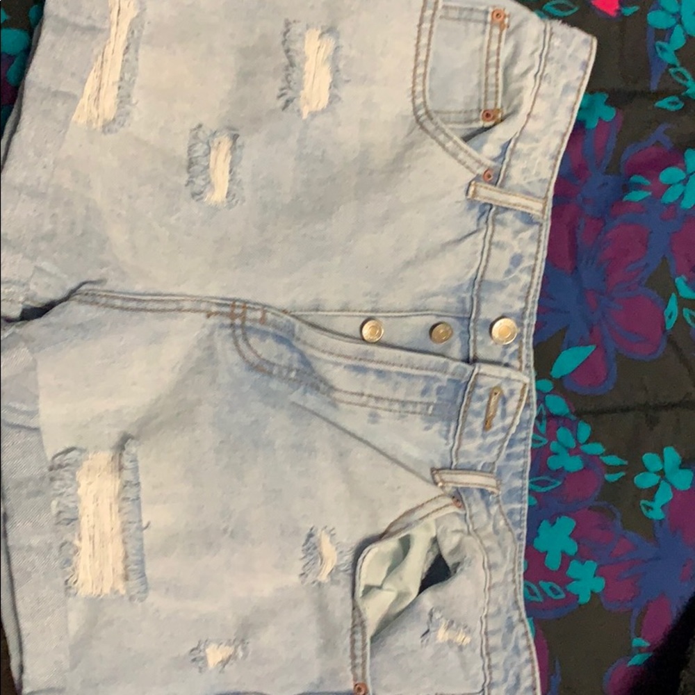 Distressed light denim jeans (Worn Once)
